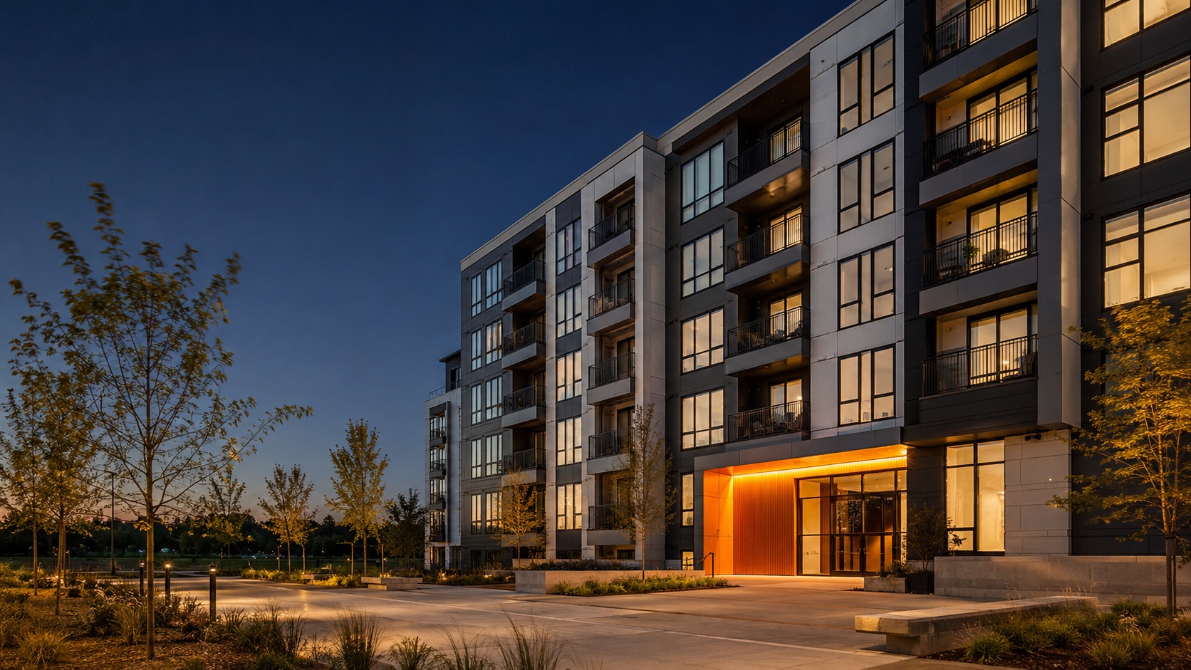 Factory-built multifamily building at dusk (illustrative concept)